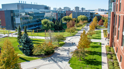 WSU Spokane campus lawn and trees view from building